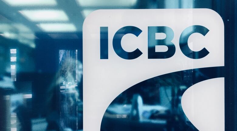 Blue glass with a white ICBC logo on it