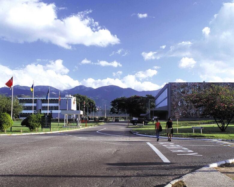 Image of a road with 2 buildings