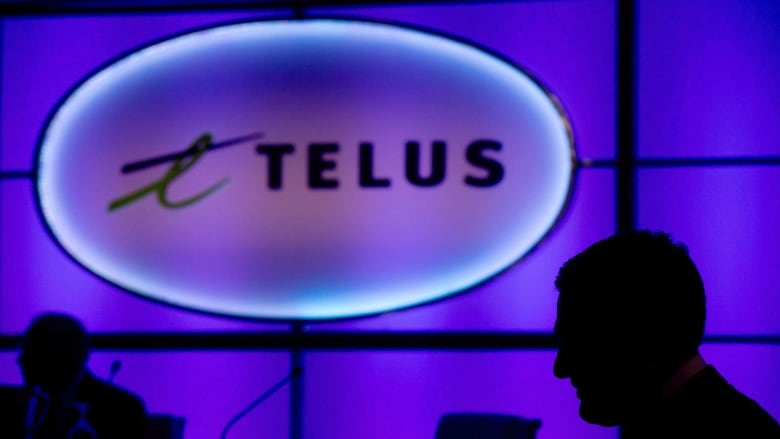 The Telus logo is silhouetted against a purple background.  