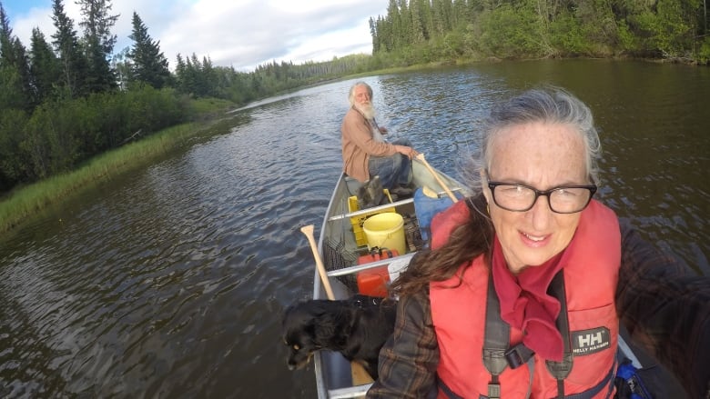 Two people in a canoe. 