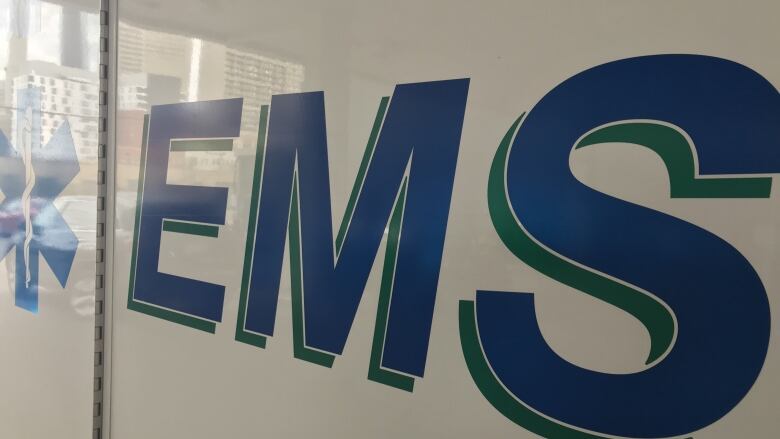 A close-up sign of EMS.