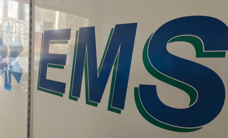 A close-up sign of EMS.