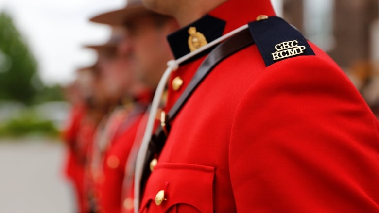 Royal Canadian Mounted Police (RCMP) cadets stand at a graduation ceremony at the RCMP Academy, Depot Division in Regina on June 5, 2017.