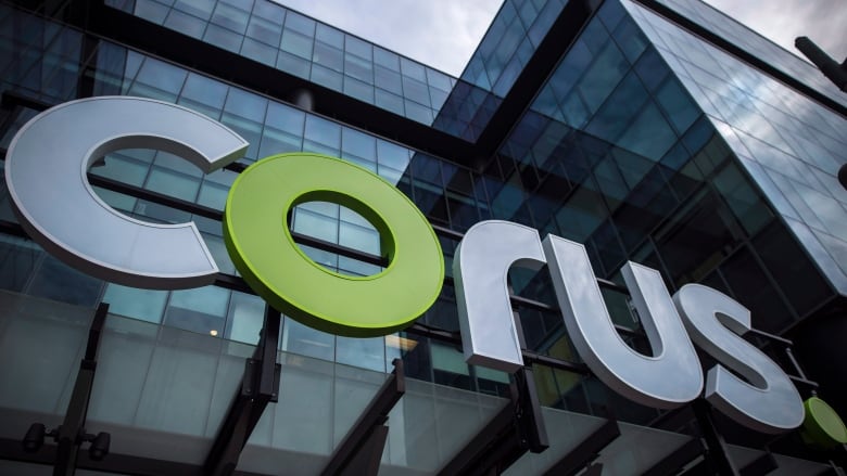 The new Corus logo is seen on the side of a high-rise building.