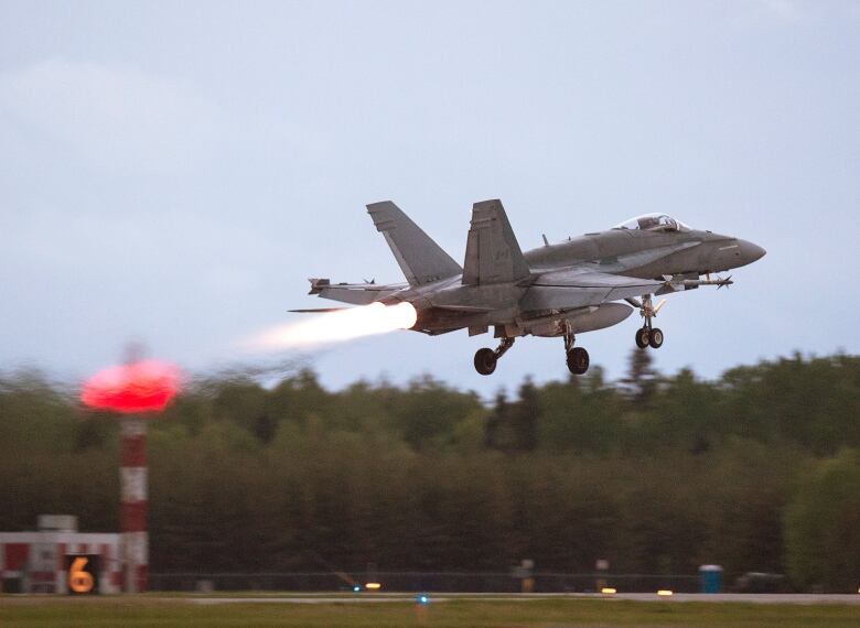 An RCAF CF-18 takes off from CFB Bagotville, Que.