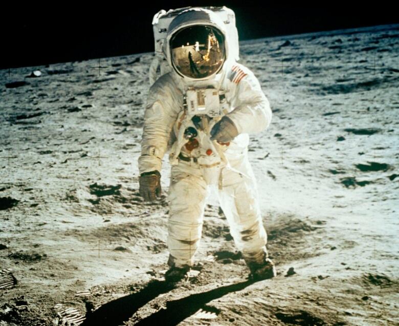 Astronaut Edwin (Buzz) Aldrin Jr. walking on the moon.