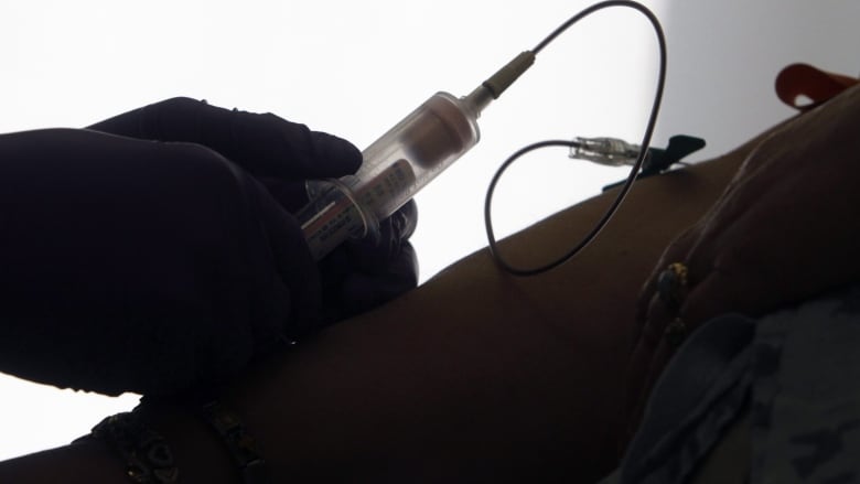 A patient has her blood drawn for a liquid biopsy at a hospital in Philadelphia.