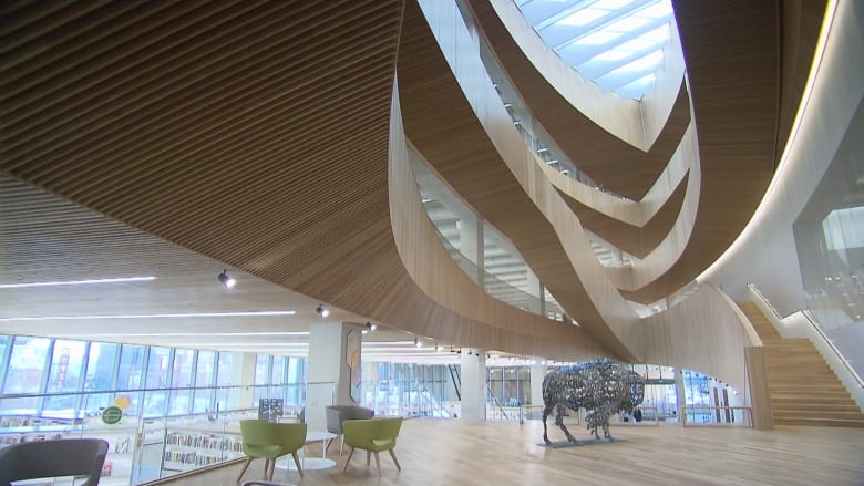 The inside of a large building with multiple staircases.