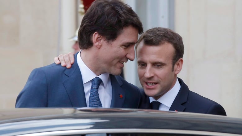 Canadian Prime Minister Justin Trudeau, left, says goodbye to French President Emmanuel Macron after a meeting at the Elysee Palace in Paris, Monday, April 16, 2018. Macron is scheduled to meet Trudeau next week in Ottawa before they sit down with their G7 counterparts for the leaders' summit in La Malbaie, Que.