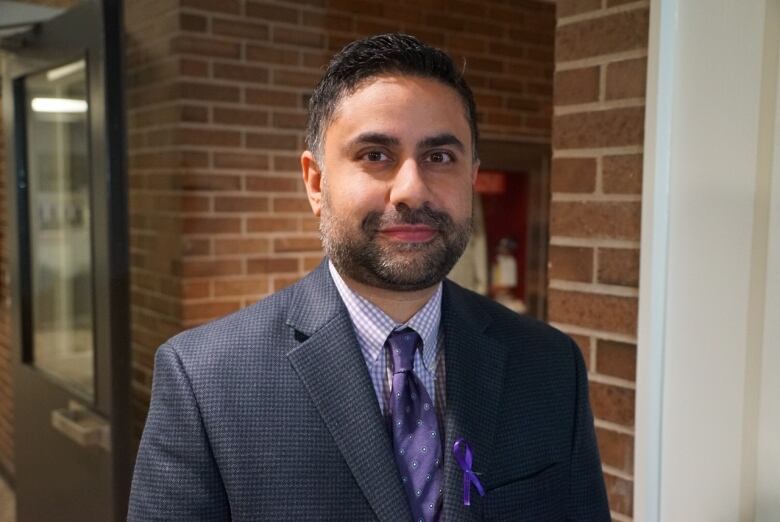 Dr. Javeed Sukhera sits on the police board. He will leave his position as chair in the fall.