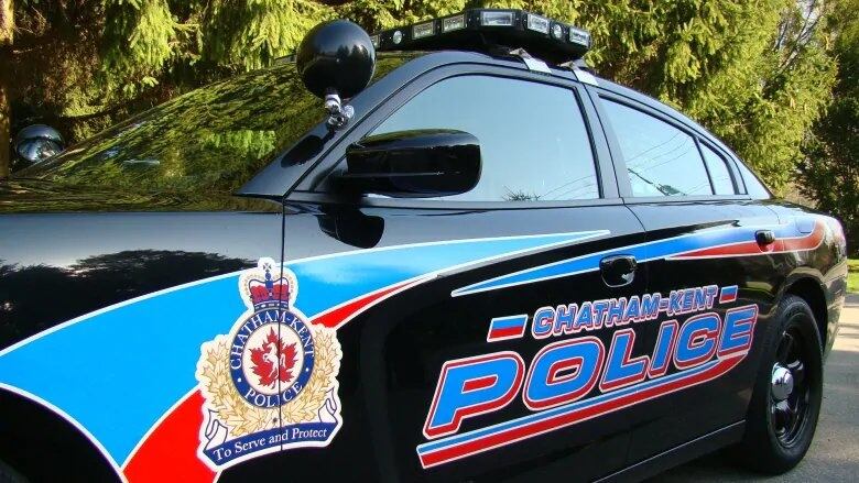 A close-up shot of a black Chatham-Kent police cruiser.