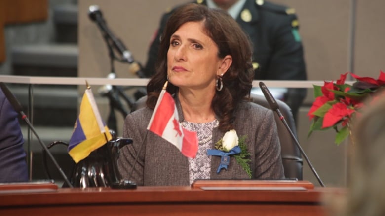 A woman at a desk