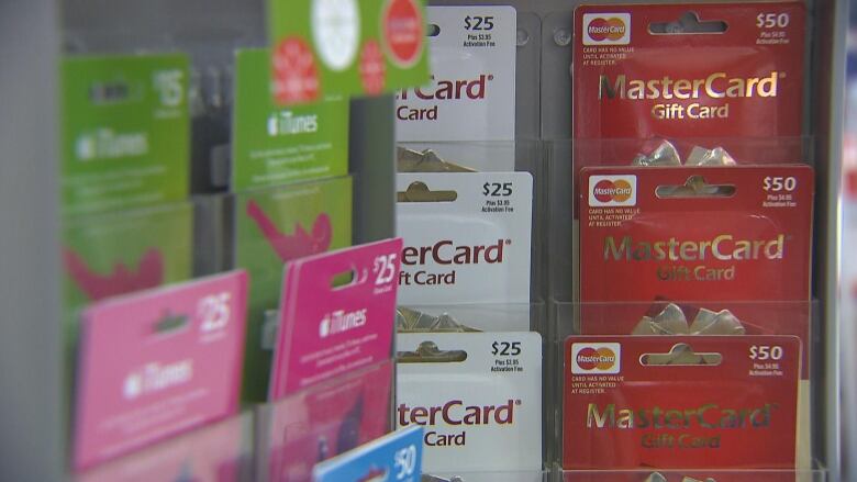 Rows of gift cards in a store. 