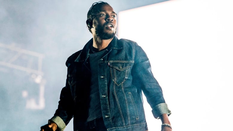 FILE - In this July 7, 2017, file photo, Kendrick Lamar performs during the Festival d'ete de Quebec in Quebec City, Canada. A list of nominees in the top categories at the 2019 Grammys, including Lamar, who is the leader with eight nominations, were announced Friday, Dec. 7, 2018, by the Recording Academy. Drake, Cardi B, Brandi Carlile, Childish Gambino, H.E.R., Lady Gaga, Maren Morris, SZA, Kacey Musgraves and Greta Van Fleet also scored multiple nominations. (Photo by Amy Harris/Invision/AP, File)