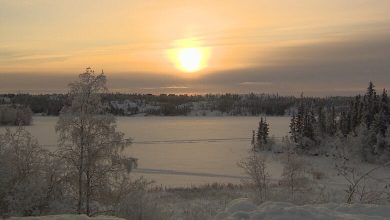 frozen lake, frozen trees, sunset.