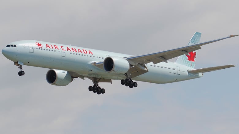 An Air Canada plane flying.