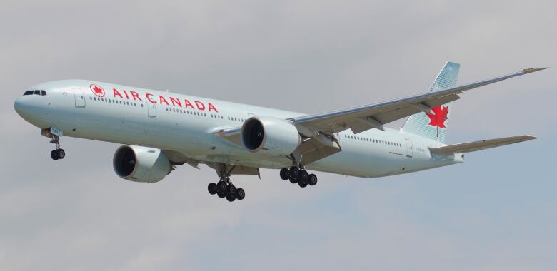 An Air Canada plane flying.