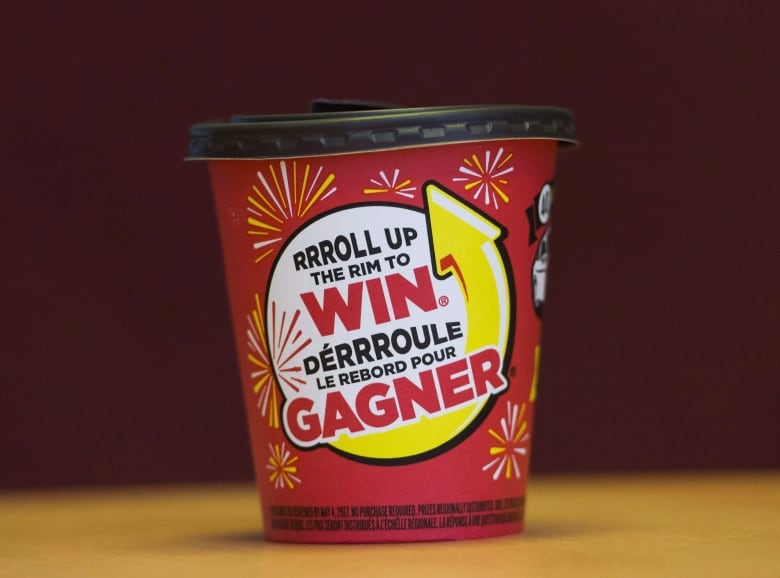 A Tims cup with old Roll Up the Rim logo