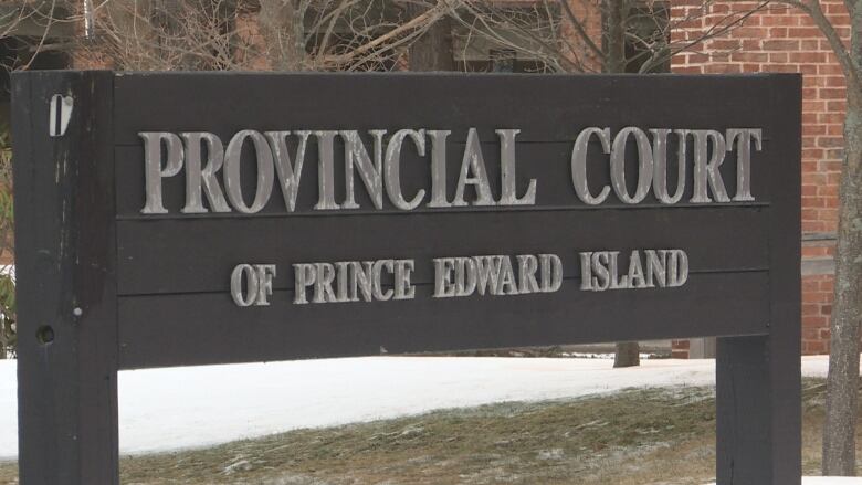 A photo shows the sign for Charlottetown's Provincial courthouse. 