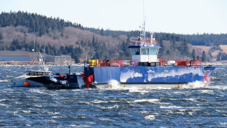 Ferry in blue waters 