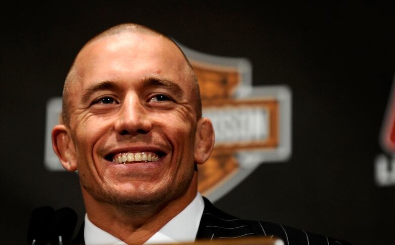 Georges St-Pierre of Montreal, Quebec, a two-division champion announced his retirement from mixed martial arts at the Bell Centre.