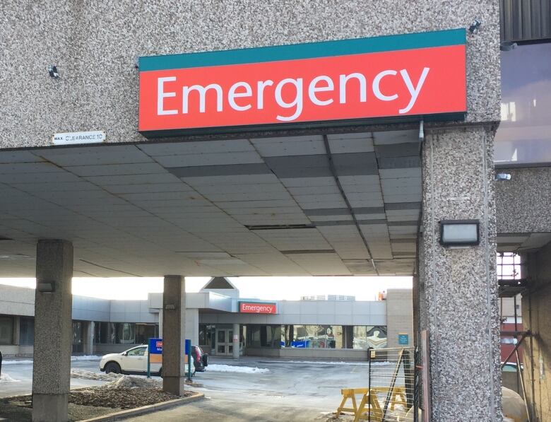 An emergency department sign is shown.