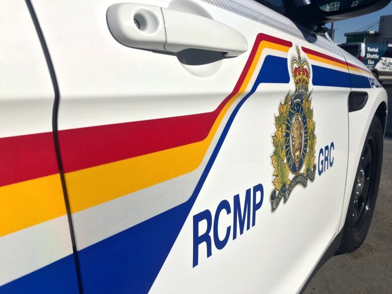 A close-up of the side of an RCMP vehicle.