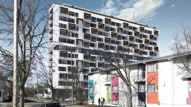 An artist's rendering of a tall, 12-storey condo development. 