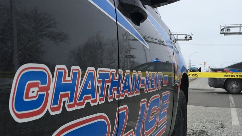 A photo of a black police cruiser with the Chatham-Kent police logo. 