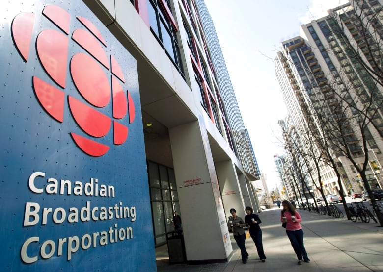 The exterior of a large building bearing the CBC logo. 