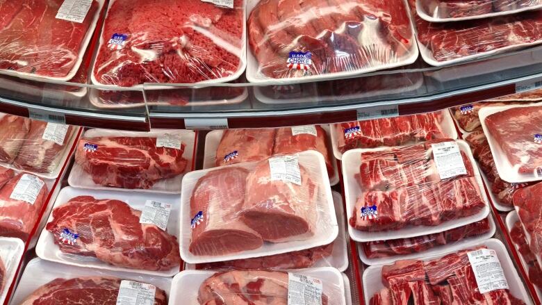 FILE - In this Nov. 2, 2013 file photo, various cuts of beef and port are displayed for sale in the meat department at a discount market in Arlington, Va.  Cattle groups from the U.S. and Canada are upset that a new Farm Bill passed by the House on Wednesday, Jan. 29, 2014, fails to make changes to country-of-origin labeling requirements. The rules require detailed labels about the origins of beef, pork and chicken sold in U.S. stores.