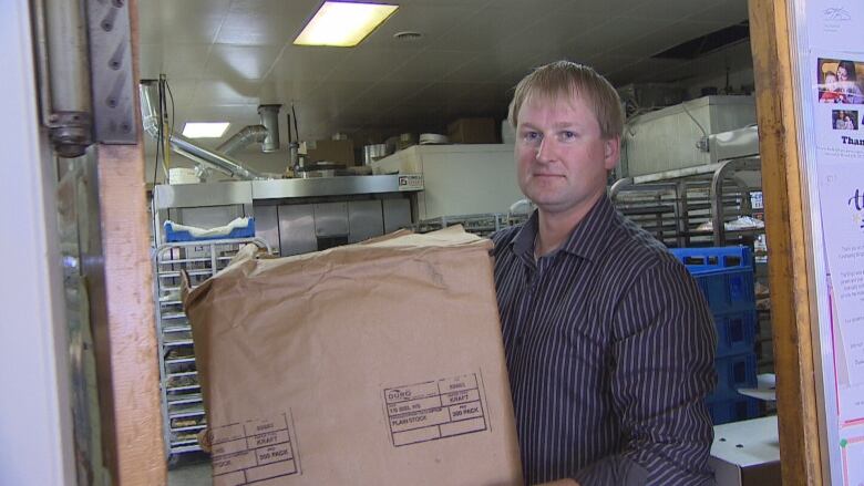 Man holding large box