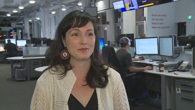 A woman is seen during an interview in the CBC Halifax newsroom.