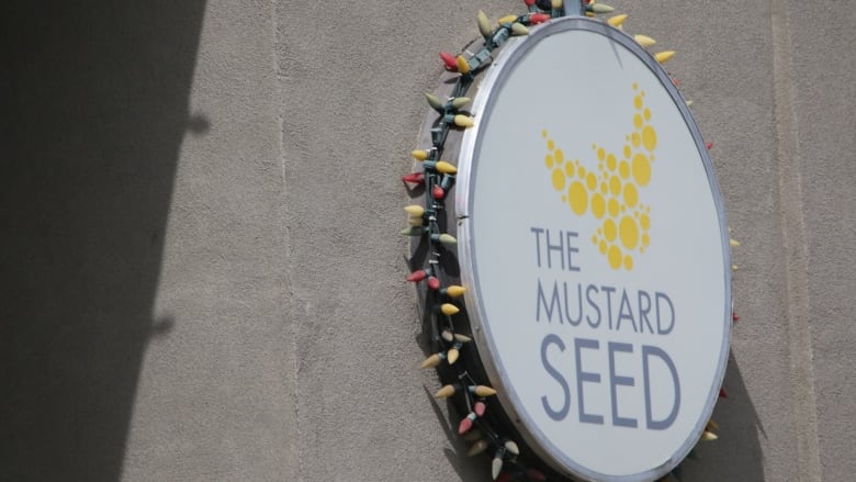 a logo that read The Mustard Seed is pictured.