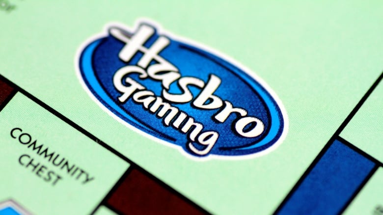 The Hasbro Gaming logo is shown on a Monopoly board.