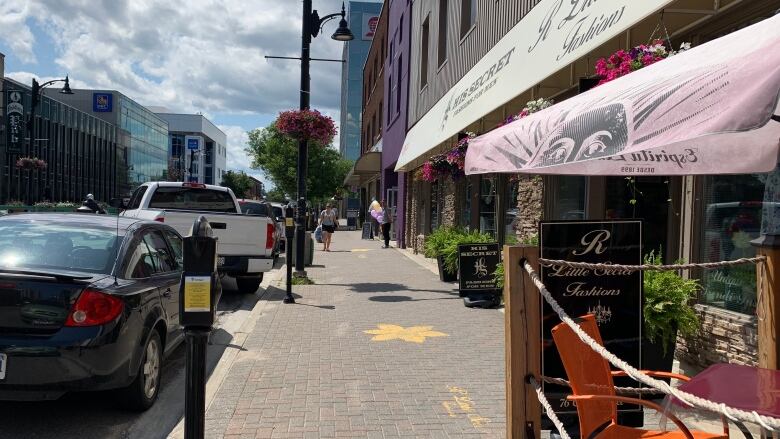 downtown sudbury sidewalk on a sunny day. 