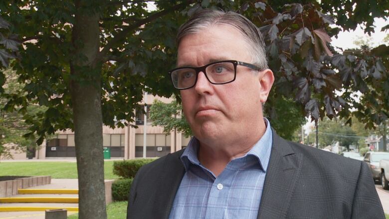 Steven Myers outside of government buildings in Charlottetown.