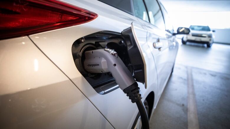 Electric vehicle chargers are pictured at a parking lot in Surrey, British Columbia on Wednesday, September 25, 2019. 