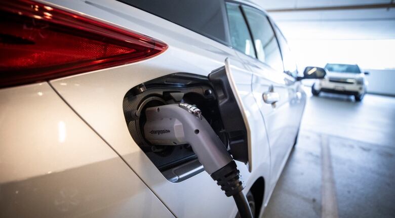 Electric vehicle chargers are pictured at a parking lot in Surrey, British Columbia on Wednesday, September 25, 2019. 