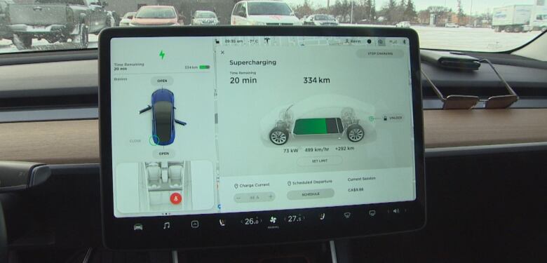 Belanger says it takes about 20 minutes to charge his Tesla 3 at a fast-charging station.