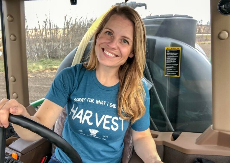 Lesley Kelly inside a tractor.