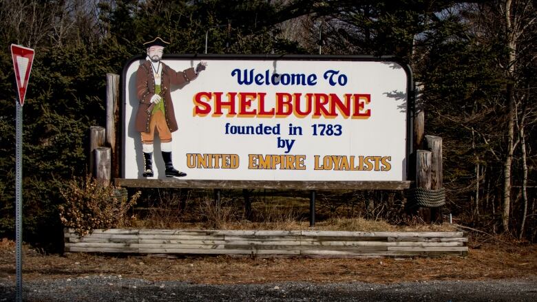 A sign at the edge of a street that says, 'Welcome to Shelburne, founded in 1783 by United Empire Loyalists.'