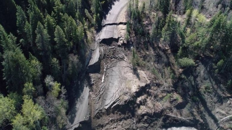 An aerial view of a destroyed road.