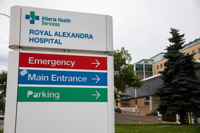 Royal Alexandra Hospital hospital sign with directions to emergency, parking and the main entrance.