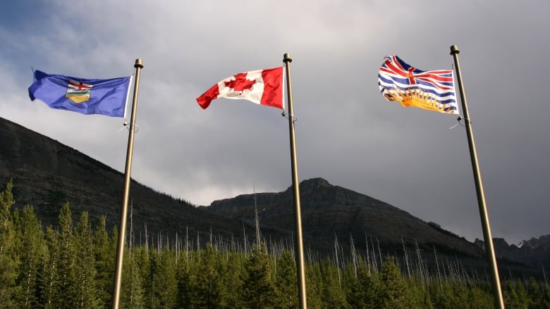 B.C. Alberta and Canadian flags.