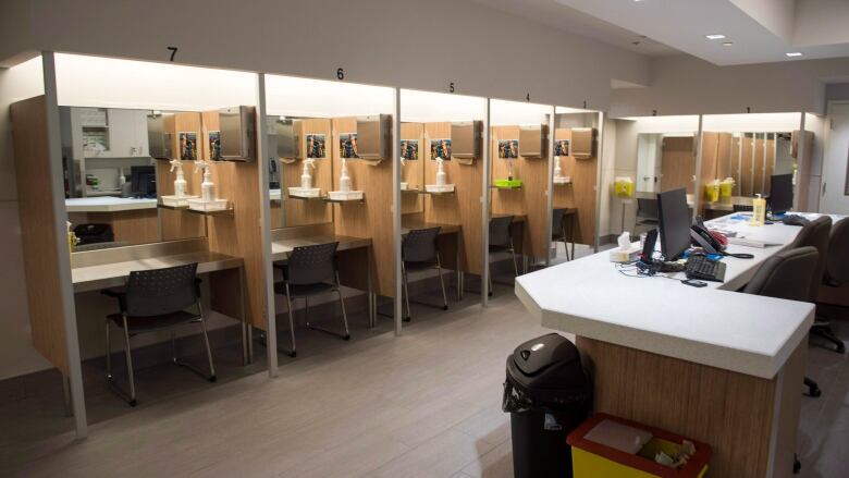 Injection booths are seen at the Cactus safe injection site Monday, June 26, 2017 in Montreal. THE CANADIAN PRESS/Paul Chiasson