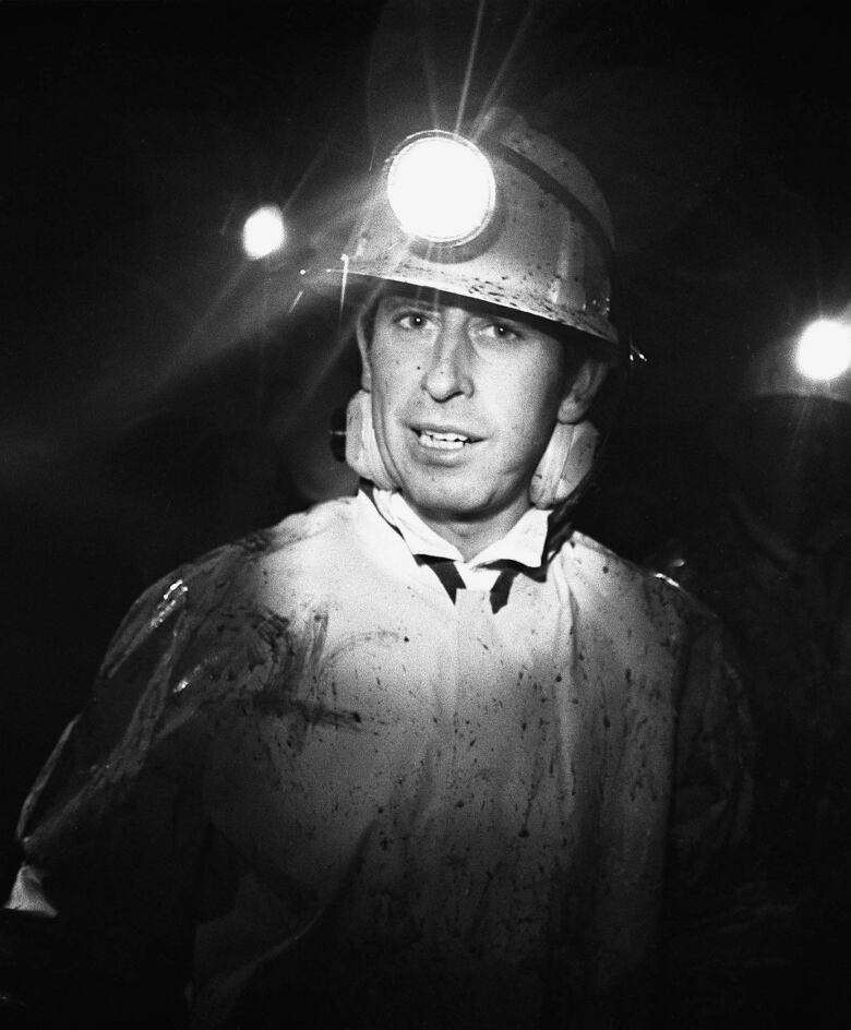 Prince Charles wearing miner's hat