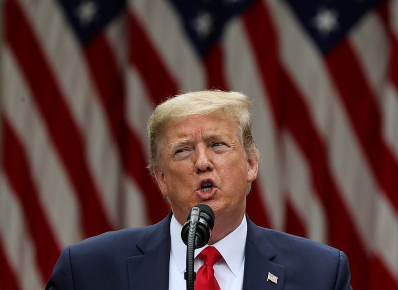 FILE PHOTO: U.S. President Donald Trump makes an announcement about U.S. trade relations with China and Hong Kong in the Rose Garden of the White House in Washington, U.S., May 29, 2020. REUTERS/Jonathan Ernst/File Photo