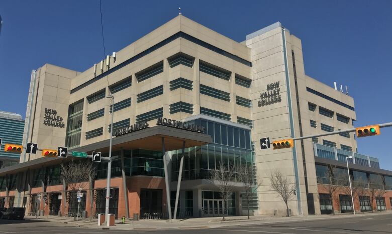 A large building on a street corner. 