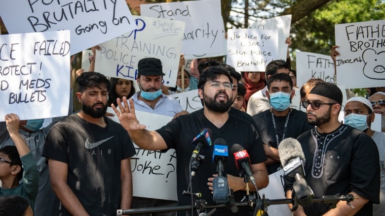 Hashim Choudhary addresses the media in front of the apartment building where his uncle, Ejaz Choudry, a 62-year-old man who family members said was experiencing a schizophrenic episode, was shot by Peel Police and died at the scene the previous night, in Mississauga, Ont., Sunday, June 21, 2020. 